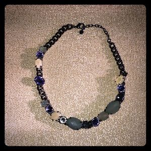 Silvertone necklace with jewels and stones